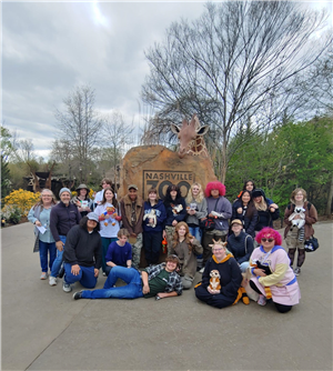 Students posing at the zoo